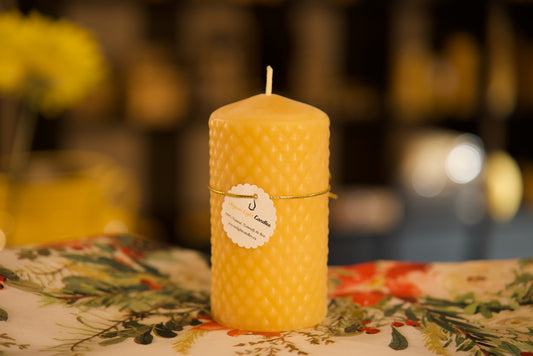 Classic pure beeswax pillar with elegant diamond pattern, sustainable home decor, 2.75x5 inches
