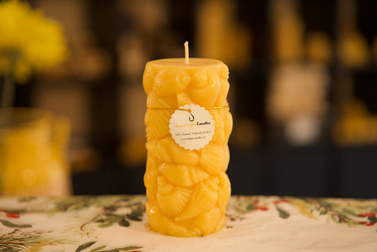 Coastal pure beeswax pillar candle with seashell motif, beach-inspired natural decor, 2.75x5 inches