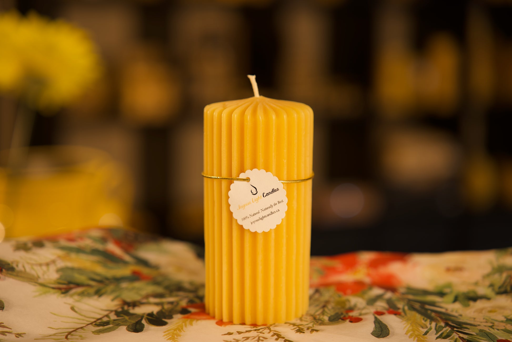 Modern pure beeswax pillar with vertical ridge texture, contemporary natural decor, 2.5x5 inches